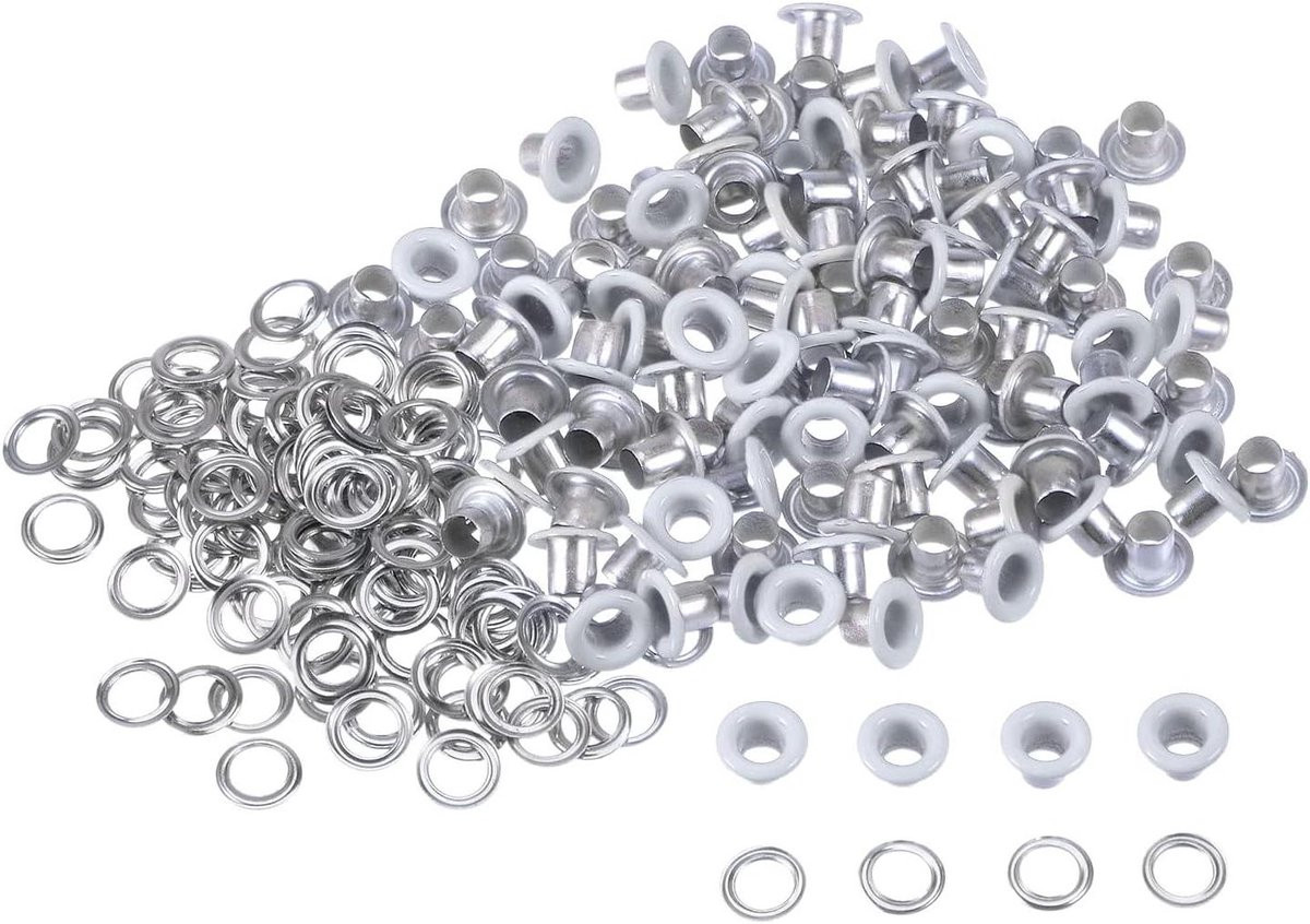 Set van 100 witte metalen oogjes voor het repareren van kleding