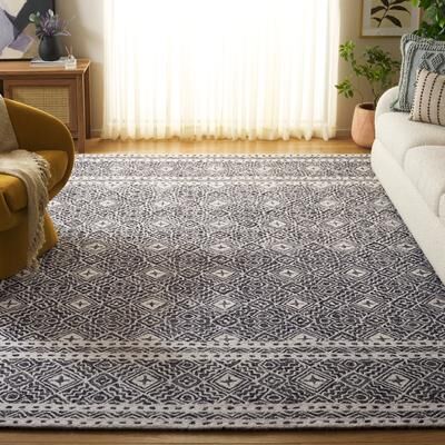 SAFAVIEH Handmade Micro-Loop Jelske Wool Rug