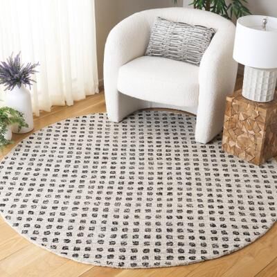 SAFAVIEH Handmade Ebony Uschi Modern Rug