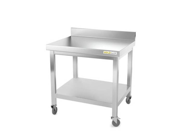 Table de travail en inox soubassement GOLDINOX PREMIUM 700 x 500 mm adossé sur roulettes