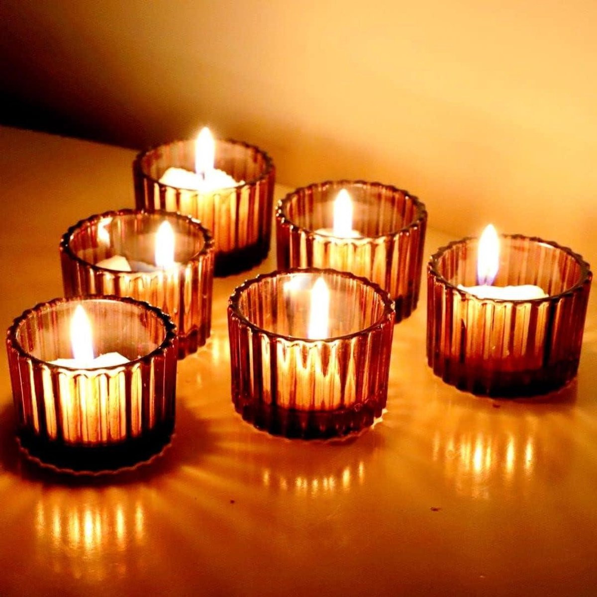 Set van 24 bruine amber glazen theelichthouders met uniek reliëf design