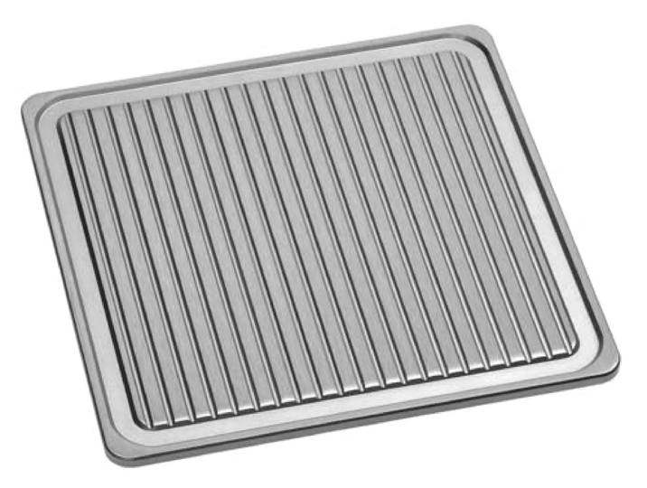 Grillplaat van geribbeld gietijzer.