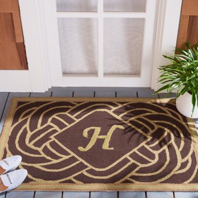SAFAVIEH Hand-hooked Monogram M Chocolate Rug