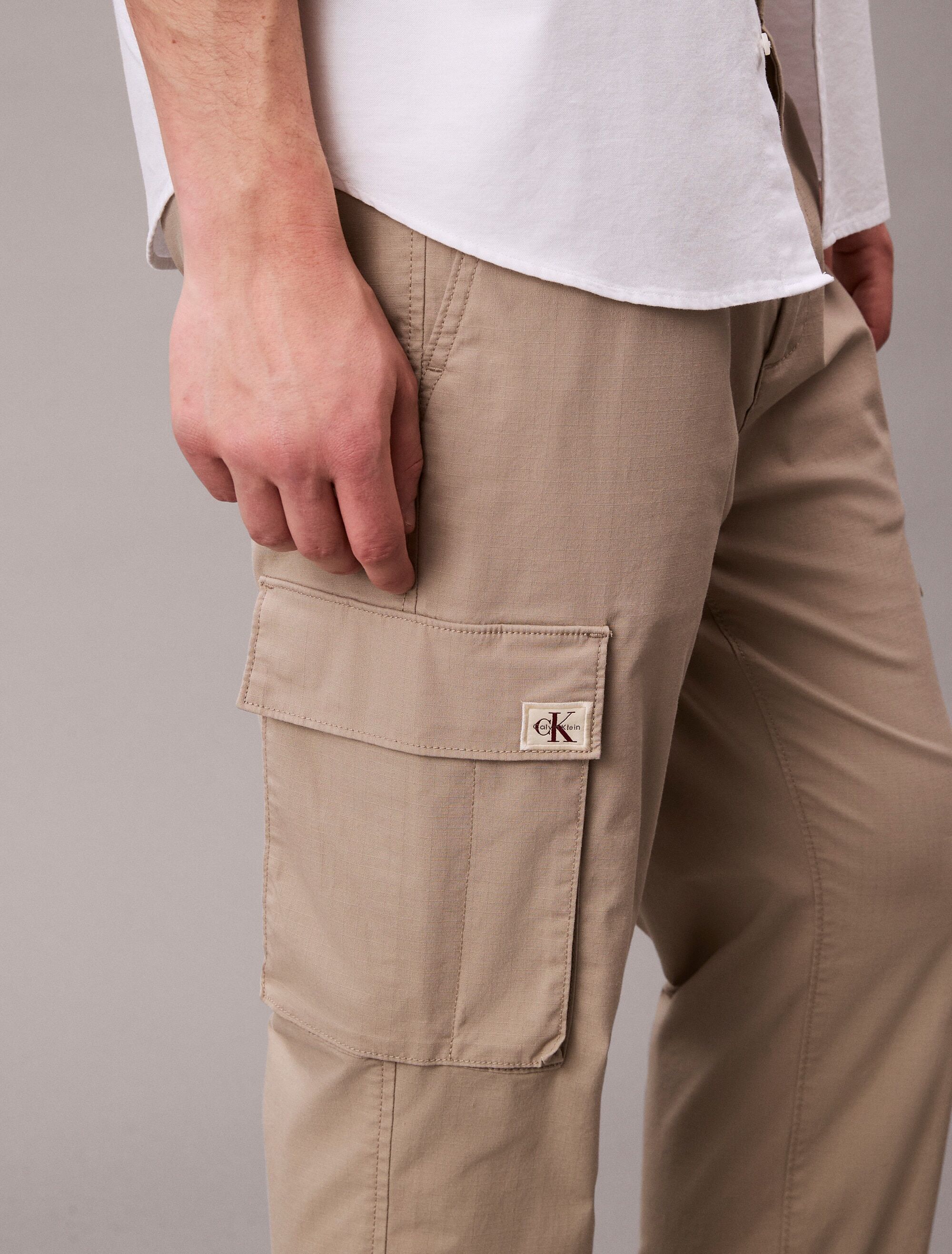Cargohose CALVIN KLEIN JEANS "PLL ON SKNNY CRG RPS", Herren, Gr. L, N-Gr, grün (vintage khaki), Web, Obermaterial: 58% Baumwolle, 39% Polyester, 3% Elasthan, unifarben, regular fit lang, Hosen Cargohose, Mit elastischem Bund vintage khaki L, N-Gr