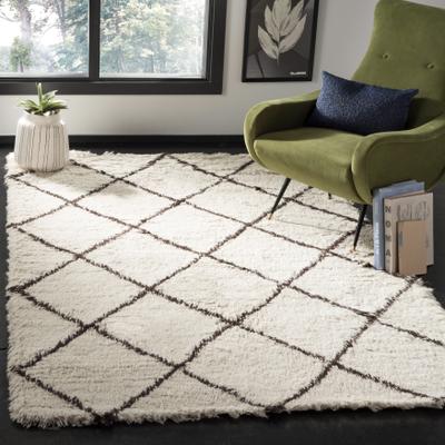 SAFAVIEH Handmade Flokati Richelle Shag Solid Wool Rug