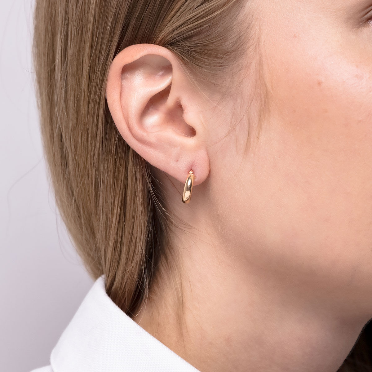 Lykken Casuals huggie hoops i gulguld 10 mm