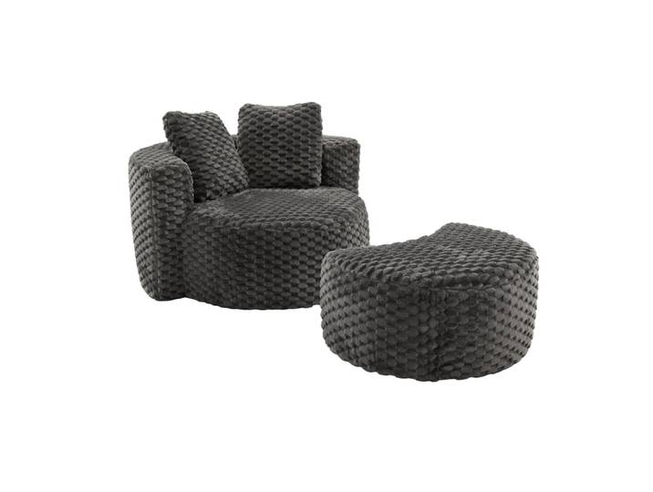 Fauteuil géant gris foncé en fausse fourrure avec pouf