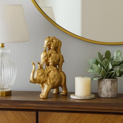 Sagebrook Home Resin Stacked Raised Trunk Elephants Figurine - Gold