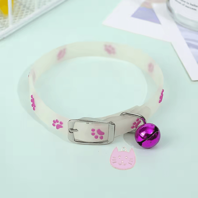 Inspire Curations Glow in the Dark Paw Print Cat Collar With Bell & Safety Buckle purple