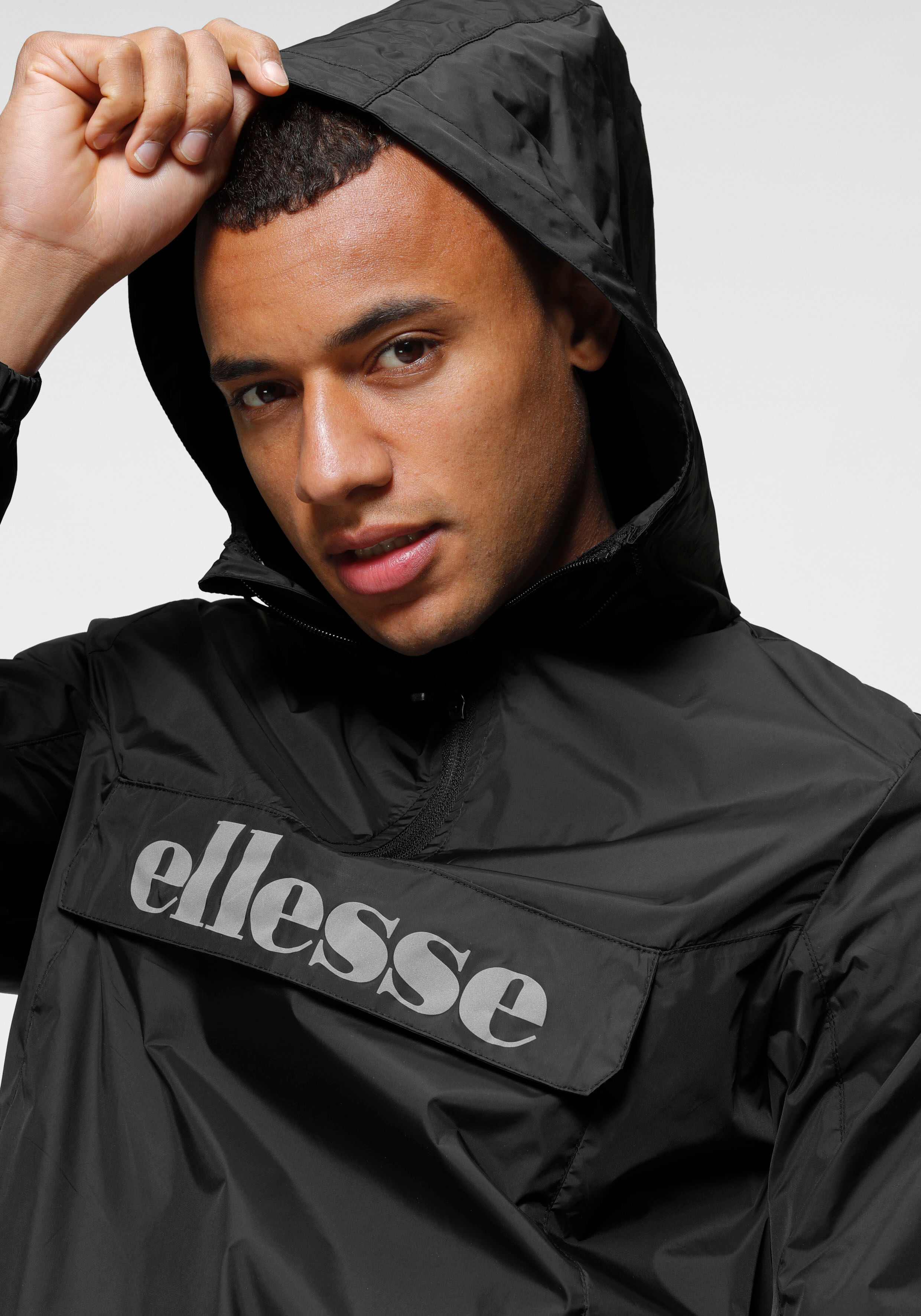 Windbreaker ELLESSE "ACERA OH JACKET", Herren, Gr. XL, schwarz, Obermaterial: 100% Polyamid, Basic schmal hüftlang, hoch geschlossener Ausschnitt, Bündchen mit Gummizug, Jacken Windbreaker, Übergangsjacke, hüftlang, mit Kapuze schwarz XL