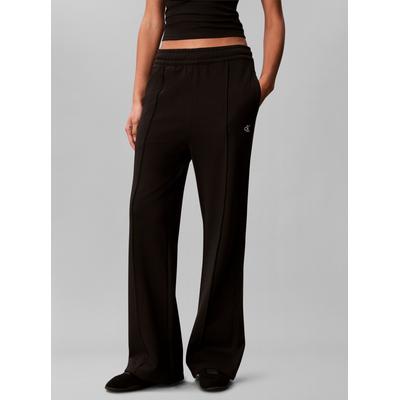Leggings CALVIN KLEIN JEANS "MONOGRAM TERRY TRACKPANT", Damen, Gr. XS, N-Gr, schwarz, Web, Obermaterial: 90% Baumwolle, 10% Polyester, unifarben, bootcut fit lang, Hosen Leggings, Regular fit mit Bootcut fit
