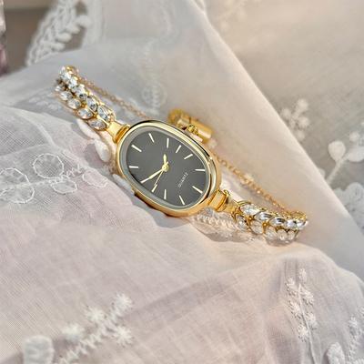 Youfap Market Best selling Elegant Leaf Embedded Diamond Quartz Watch, New Oval Pull Cord Fashion Bracelet black