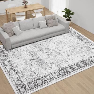 Garvee Faded Distressed Medallion Area Rug