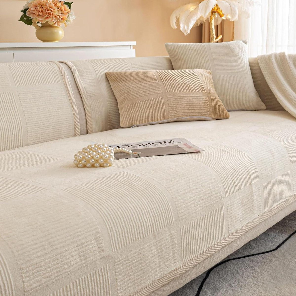 Universele beige bankovertrek met antisliponderlaag voor het beschermen van je sofa