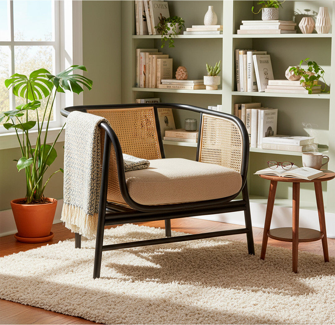 Bay Isle Home Seoul Black Wicker rattan chair with webbing Black 81cm H X 80cm W X 75cm D