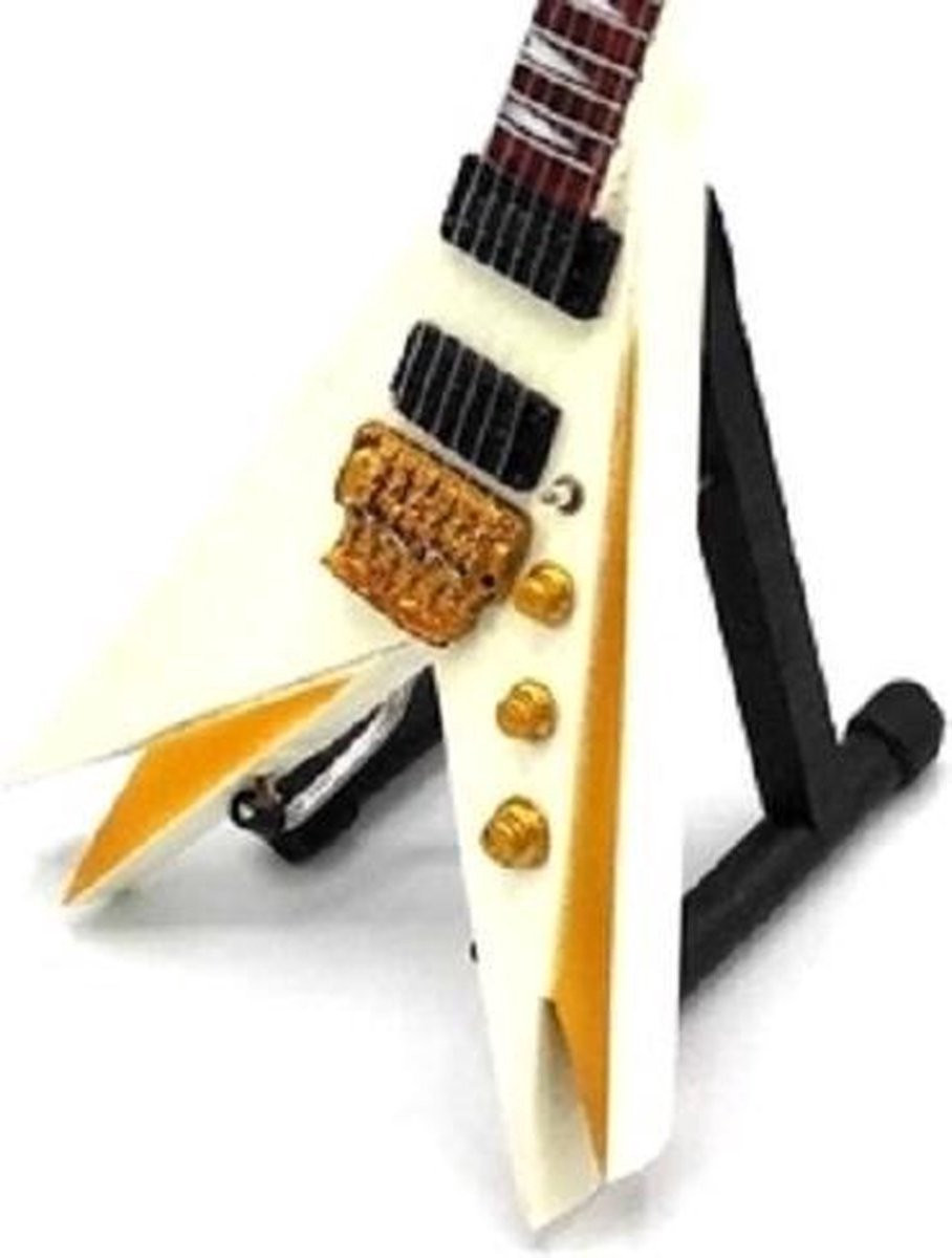 Miniatuur replica Jackson gitaar van Vinnie Vincent van KISS voor op tafel