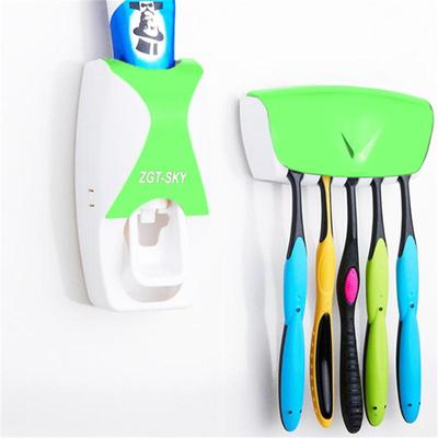 Snug & Styled Automatic Toothpaste Dispenser And Wall Mounted Toothbrush Holder Set green
