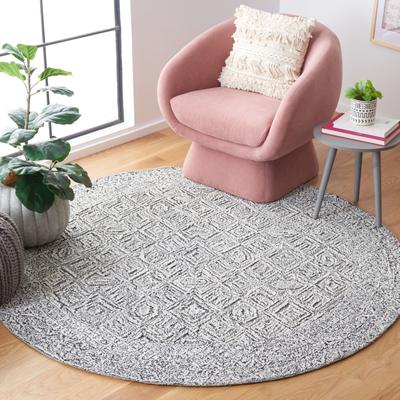 SAFAVIEH Handmade Textual Margund Wool Rug