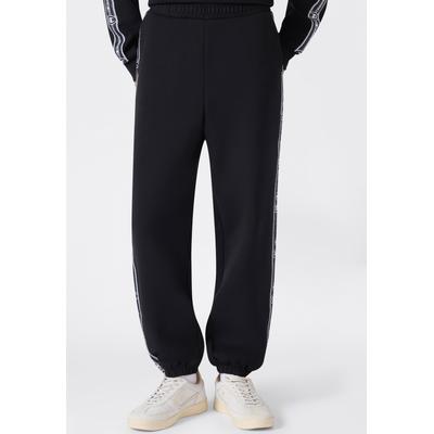 Jogginghose CHAMPION "SPORTWEAR CUFFED PANTS Loose Fit Stretch Cotton", Damen, Gr. S, N-Gr, schwarz (nbk), Obermaterial: 69% Polyester, 26% Baumwolle, 5% Elasthan, Hosen Jogginghose, mit Cuffed Pants Schnitt, in Stretch-Qualität, Loose Fit