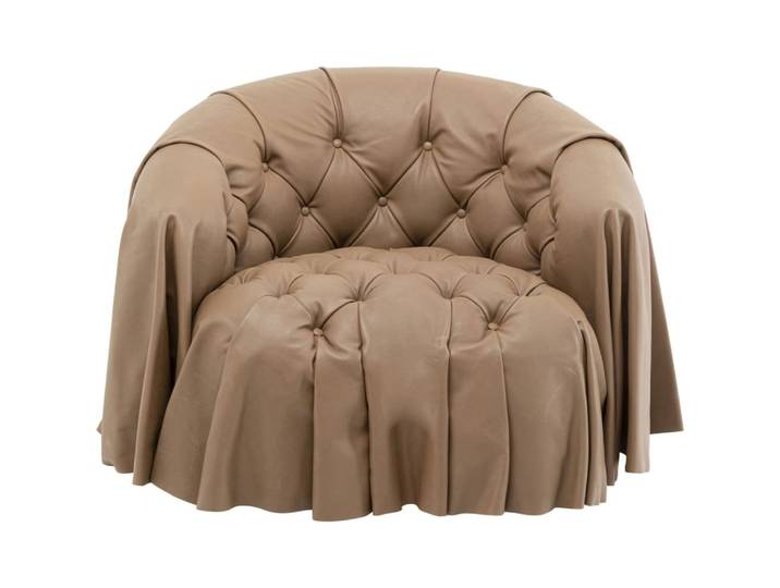Fauteuil capitonné en cuir
