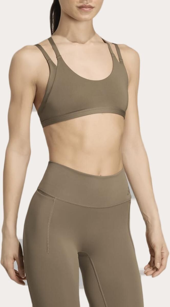 Adidas Top de mujer Optime .  (M) Beige